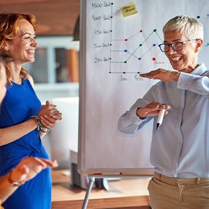 Older woman at work and smiling