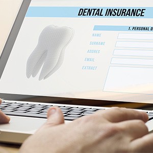Dental insurance form on a laptop