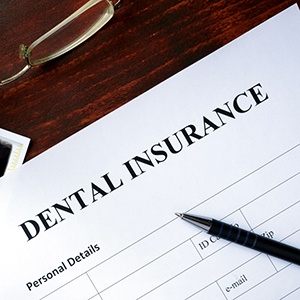 Dental insurance form resting on a table