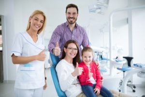 Happy family visiting their Frisco family dentist