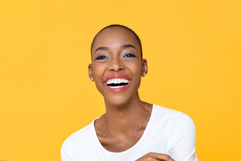 woman wearing temporary veneers in Frisco